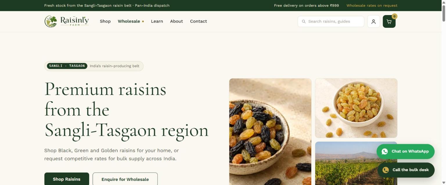 The Raisinly Farm homepage: Premium raisins from the Sangli-Tasgaon region, with Shop Raisins and Enquire for Wholesale actions and a Wholesale item in the navigation.